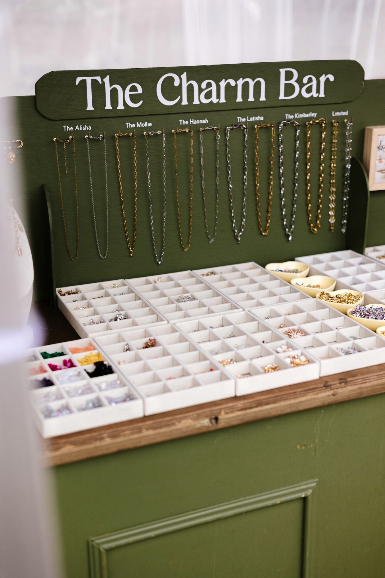 Chains and charms laid out ready to build jewellery
